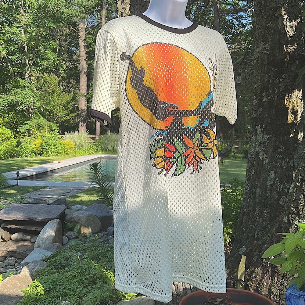 Gotcha by icons of culture mesh mini dress.